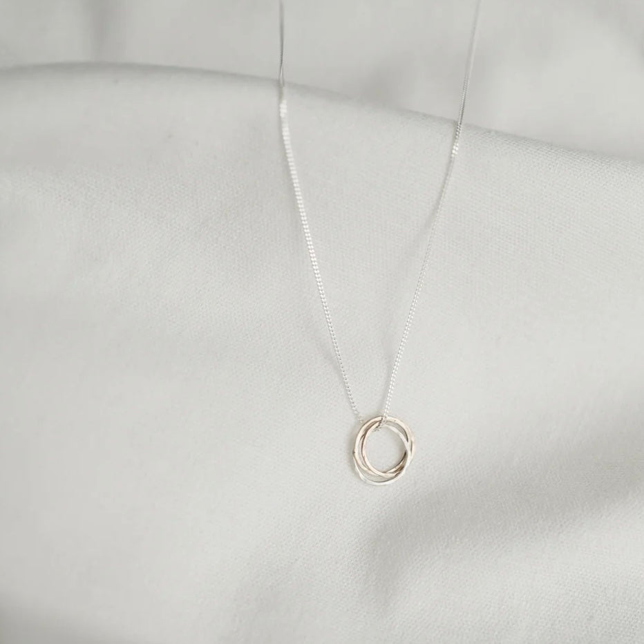Trio Of Metals Knot Pendant image 0